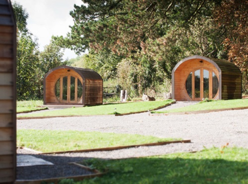 A couple of the lodges at Star Glamping in Ullenwood