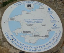 The Pembrokeshire Coast Path plaque at the start at Amroth