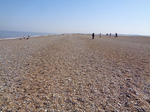The start of the long leg-sapping stretch of shingle beach after Cley