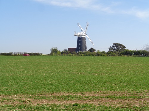 Looking across at the Windmill in Burnham Overy Staithe