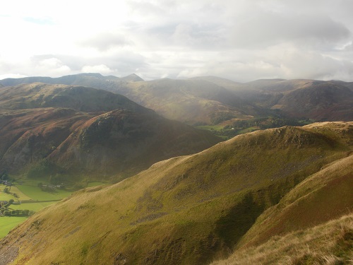 A range of hills including Helvellyn and the pointy summit of Catstycam
