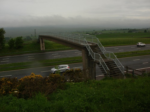 The bridge over the M62 on a wet miserable May morning