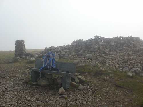 A welcome bench on High Pike summit in the gloom