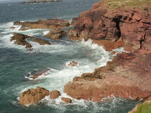 Ocean waves crashing off the rocks
