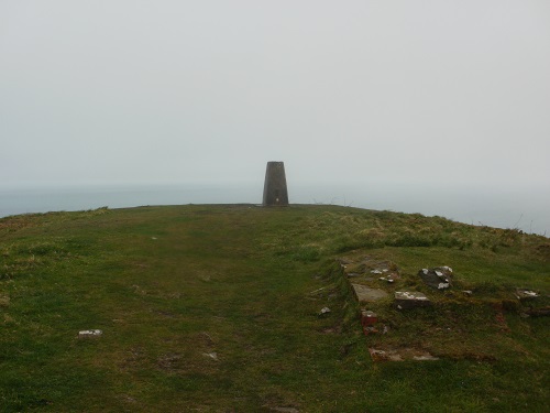 The Trig Point at the top of Dinas Head