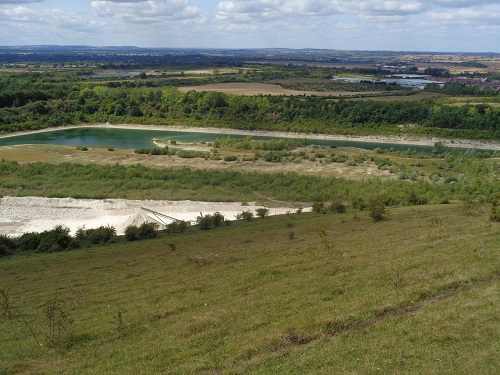 A water filled old chalk pit, popular with swimmers