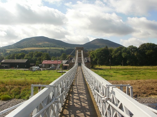 Looking back at the Eildon Hills from the Chain Bridge in Melrose