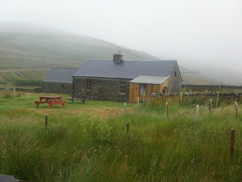 A welcome break from the rain inside Over Phawhope Bothy