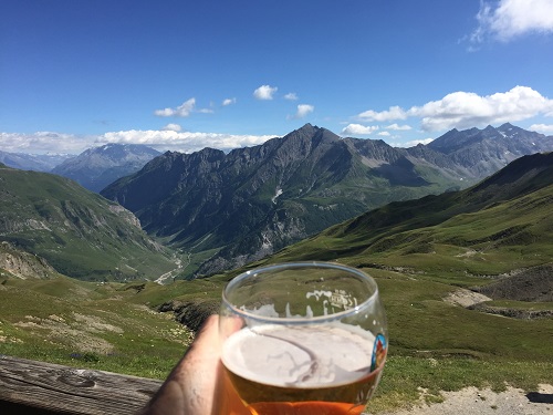 Enjoying a beer with a view from the Refuge de la Croix du Bonhomme
