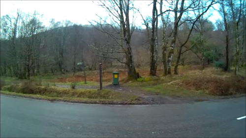 Crossing over the road and up into the woodland in Kinlochleven